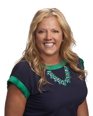 Portrait of Amanda Lauser, REALTOR®.